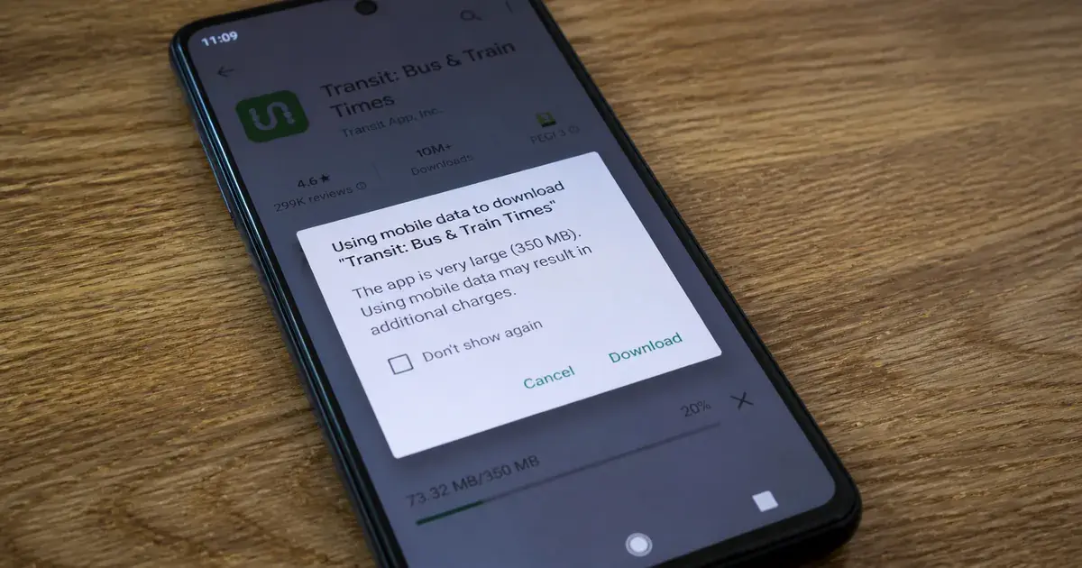 Photograph: an Android phone on mobile data showing the Google Play large-file-size warning before downloading a 350 MB app.